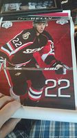 Poster showing hockey player number 22 from Ottawa Senators in team jersey, holding hockey stick on ice.