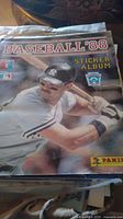 Cover of 1988 Panini Baseball Sticker Album showing an action shot of a batter in New York Yankees uniform holding a bat.