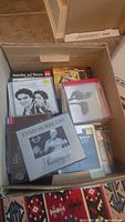 Box showing various classical music CDs including Ennio Morricone and Ariadne auf Naxos.
