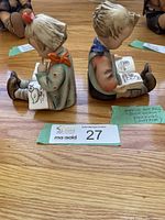 Front view of both bookends side by side on wood floor.