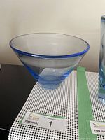 Blue vintage Holmegaard Thule blown glass vase with wide opening and narrow base, angled side view.