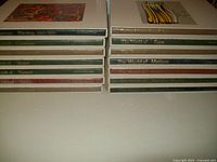 Stack of Time Life Library of Art books depicting various artists