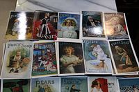 Photo of a dozen Pears Soap postcards showing various vintage advertising images including women, children, and products