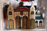 Photo of the Pickwick Carriage House porcelain lighted house showing its details and decoration.