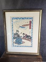 Full view of framed Japanese woodblock print, showing entire artwork with frame.