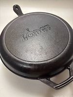 Base of the lid showing 'Lodge' embossed brand logo