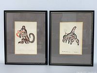 Both framed prints side by side showing overall condition and size