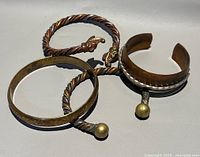 All four bangles together showing styles and finishes