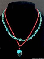 Necklace displayed on bust showing overall design