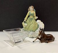 Group view of Royal Doulton figurine, Tiffany crystal bowl, Beswick horse figurine