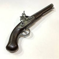 Left profile of vintage style flintlock pistol