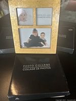 Close-up image of one gold leaf photo collage frame showing three photo slots with sample images inside and two black boxes in the background.