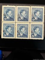 Front of block of six 5 cent stamps featuring King George VI with 'G' overprint on each stamp.