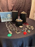 Overview of all jewelry items displayed on black cloth