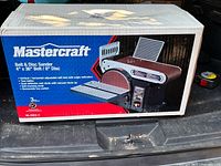 Mastercraft Belt & Disc Grinder box showing branding and product features on packaging.