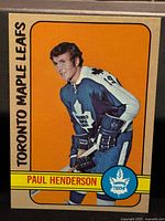 Front view of the Paul Henderson 1972-73 Topps hockey card showing the player in Toronto Maple Leafs uniform with team name and player name.