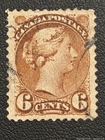 Front view of used Canada 6 cent postage stamp from 1870 featuring Queen Victoria profile in brown color, shows cancellation marks and perforated edges.