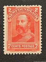 Front view of the Newfoundland 2 cent postage stamp, showing the portrait of The Prince of Wales in orange-red color with denomination markings and printing details