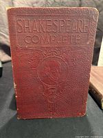 Front cover embossed with title and Shakespeare's portrait
