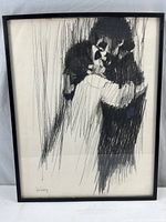 Framed black and white print of couple embracing in expressive sketch style.