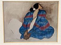 Close-up of the print showing the seated woman wrapped in a blue and red blanket, signed R.C. Gorman bottom left.