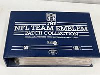 Blue binder exterior front cover reading “THE NFL TEAM EMBLEM PATCH COLLECTION” with NFL shield logo and AFC and NFC conference icons.
