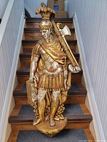 Full view of the 48-inch tall statue positioned on stairs