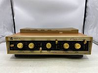 Front view showing selector, tone, balance, loudness and level controls