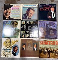 Top-down photo of all nine Frank Sinatra vinyl LP record covers arranged in a 3x3 grid showing titles and cover art.