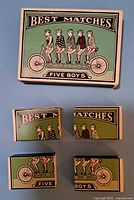 Four matchbox games with 'Best Matches Five Boys' design showing five boys on a tandem bicycle on green cover.