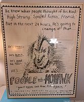 Framed poster front view showing design and text