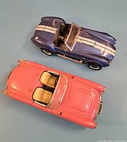 Top view of both cars showing size, colors, and details