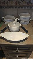 Corningware cookware set with pans, pot, and serving dish