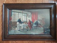 Front view of the framed lithograph showing the entire artwork and dark oak frame with glass.