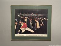 Framed Picasso print of "Le Moulin de la Galette" with Solomon R. Guggenheim Museum label hung on a plain wall, showing front view.
