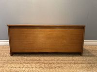 Front view of teak storage chest