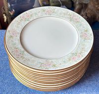 Stack of 12 Noritake Willowbrook plates showing full plate tops and gold-lined edges