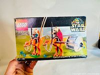 Box front showing LEGO Star Wars set 7115 Gungan Patrol with age recommendation 7-12, box worn