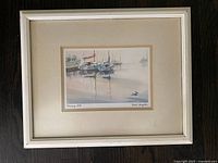 Framed watercolor painting 'Morning Still' by Brent Heighton showing whole lot in white frame with matting.