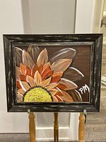 Frontal photo of the flower painting showing the full artwork and frame.