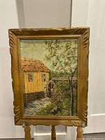 Front view of framed painting showing entire artwork and frame.