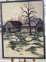 Full frontal of framed painting showing barn, tree, and chair with rustic detailing and signature