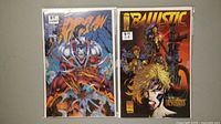 Photo showing two comic books Doom #1 and Ballistic #1 together, both with $15 price stickers in top left corners.