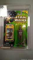 Front view of the Star Wars Power of the Jedi IG-88 action figure in original packaging showing figure and Jedi Force File card.
