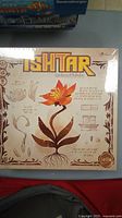 Photo of sealed Ishtar board game showing front of box with artwork and text.