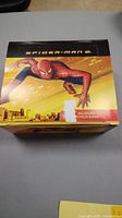 Box showing Spider-Man on front cover labeled as sticker album by Panini.