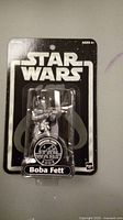 Star Wars Boba Fett collectible figure sealed in original 2003 blister packaging.