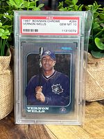 Front of the 1997 Bowman Chrome Vernon Wells baseball card in PSA slab showing Gem Mint 10 grade.