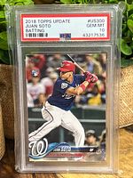 Front of 2018 Topps Update Juan Soto rookie card graded PSA 10 Gem Mint showing player batting with Washington Nationals.