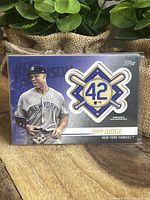 Full view of Aaron Judge New York Yankees baseball card with Jackie Robinson Patch 42 emblem and Topps brand.